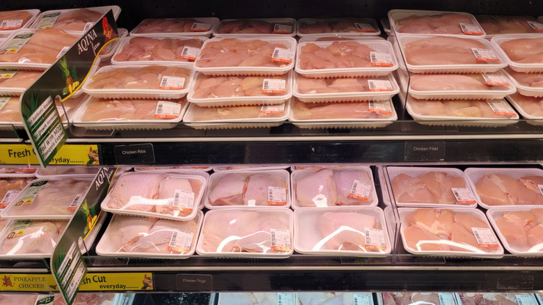 Cases of raw chicken meat