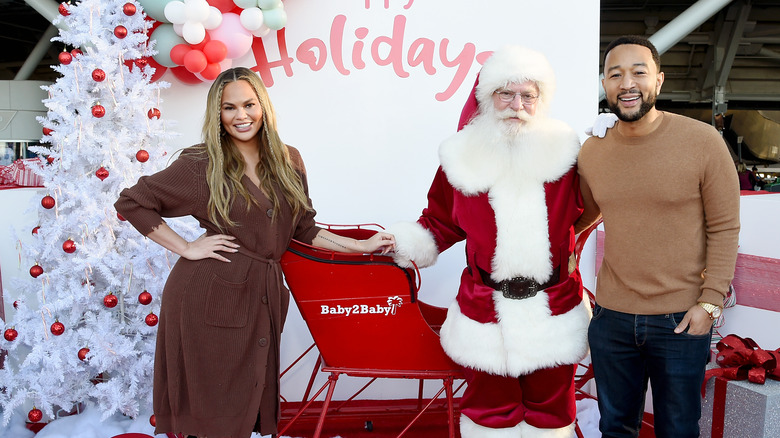 Chrissy Teigen John Legend with Santa Claus 