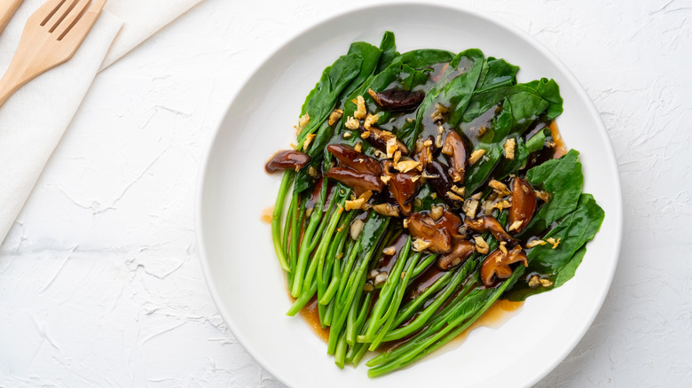 chinese broccoli covered in sauce