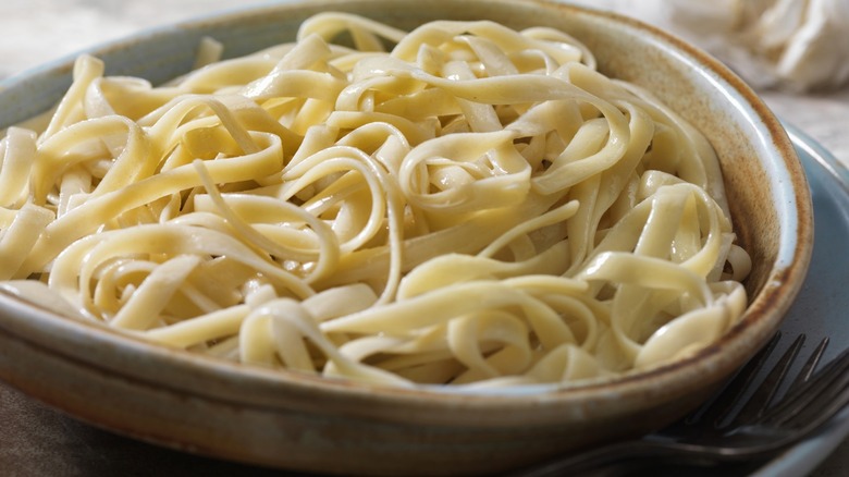 noodles in brown bowl