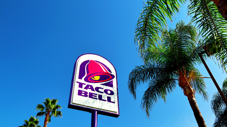 Taco Bell sign with palm trees