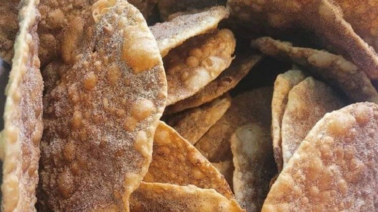 stacks of fried dough with sugar