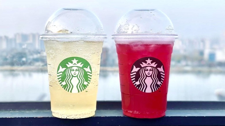 two plastic Starbucks cups with Fizzio