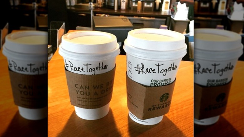 coffee cups with #RaceTogether written on sides