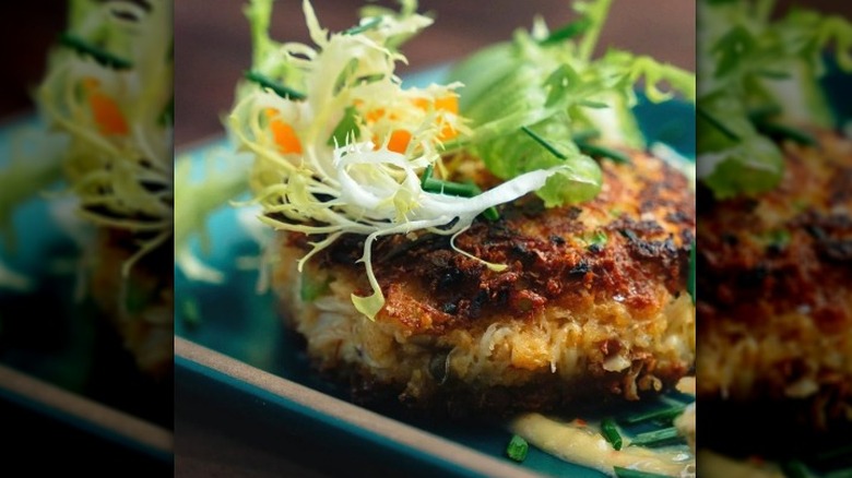 Dungeness crab cakes with frisee