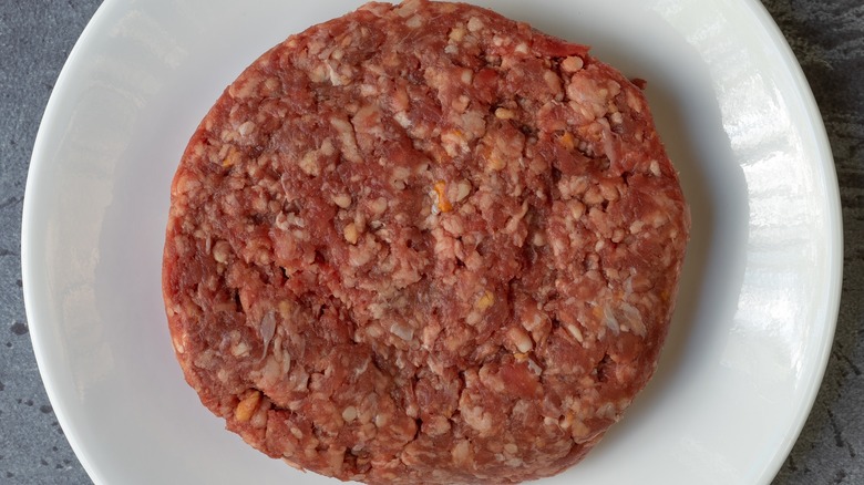 Bird's eye view of raw hamburger pattie