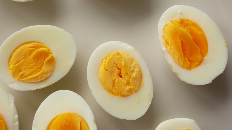 Overhead view of sliced hard boiled eggs