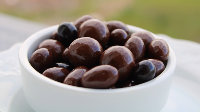 Bowl of dark chocolate snacks