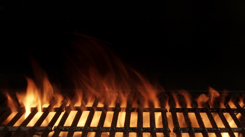 Empty grill over flames