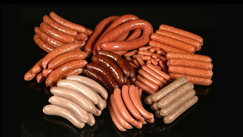 piles of hot dogs and sausages