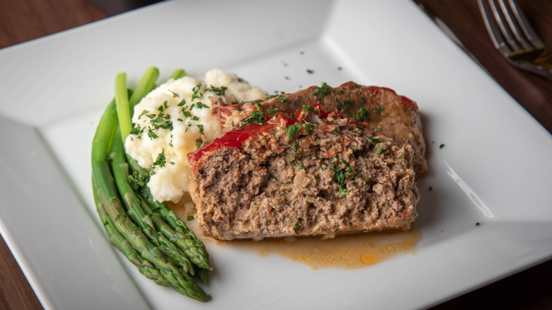 Meatloaf, mashed potatoes, and asparagus