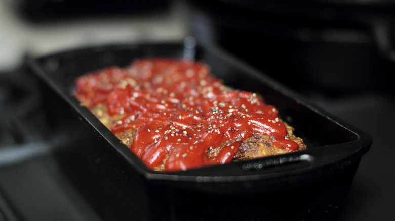 Meatloaf cooking in loaf pan