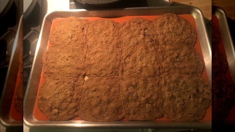 Spread-out cookies on baking sheet