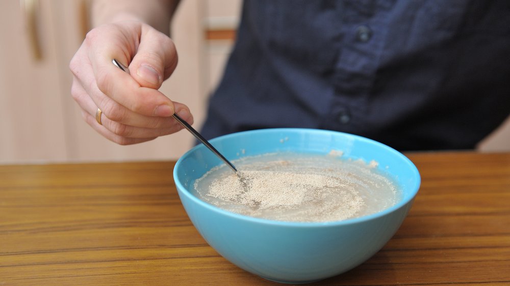 stirring yeast into water