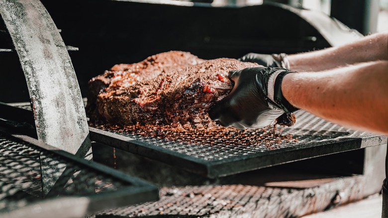 Cooking brisket slow and low in a smoker 