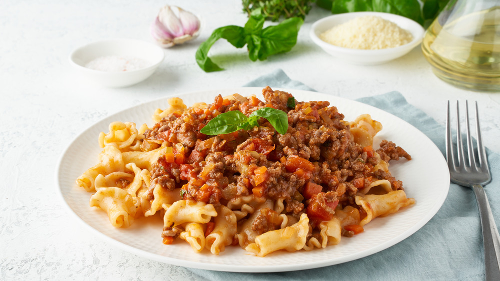 Plate of campanelle pasta with meat sauce