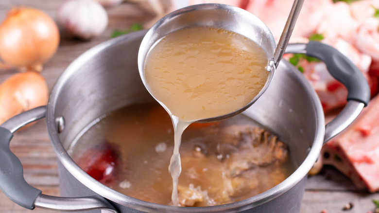 Broth in a ladle 