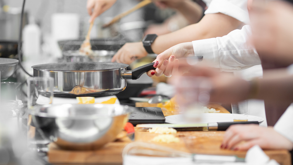 Chefs cooking multiple items