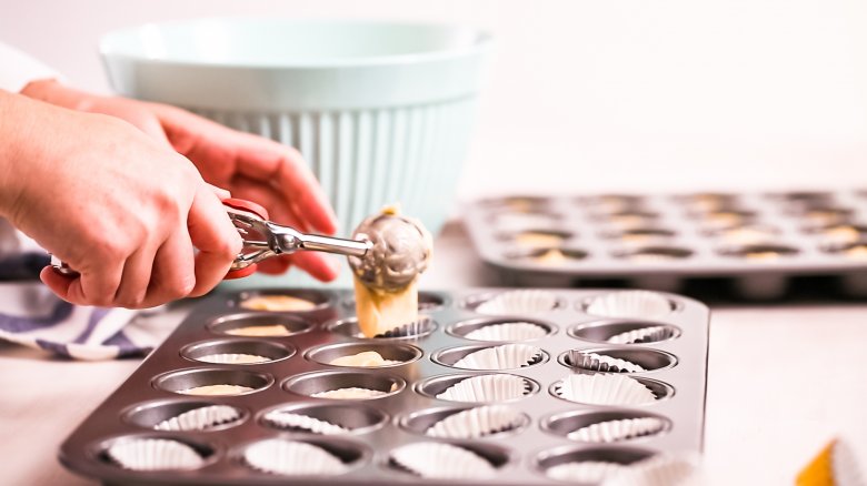 pouring batter into liners