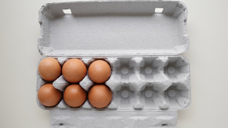Carton of opened eggs
