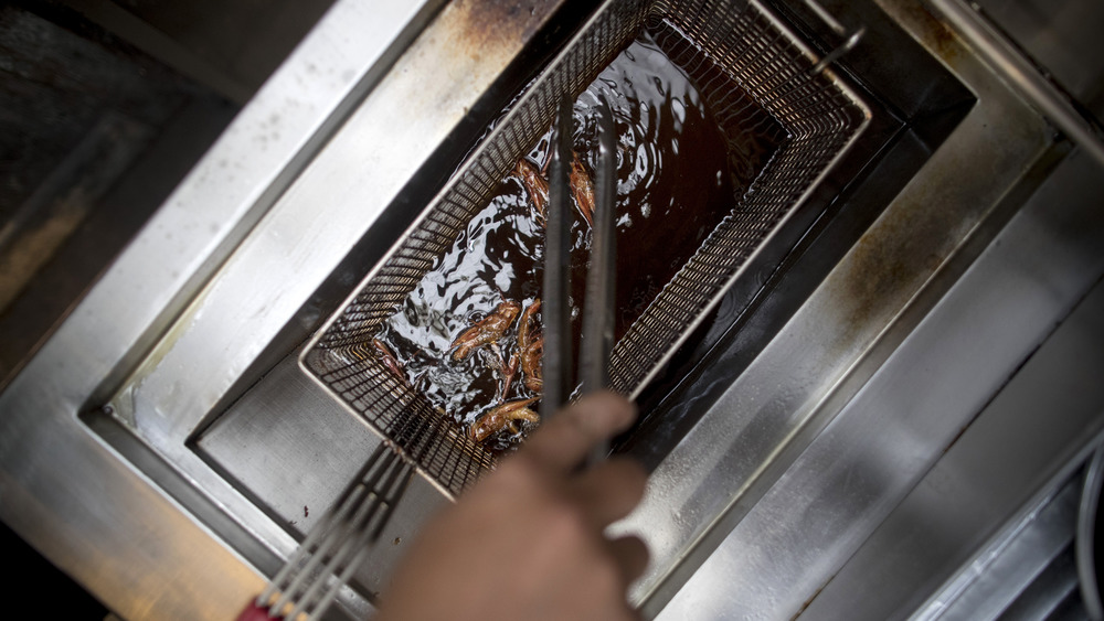 deep-frying pan with food at restaurant