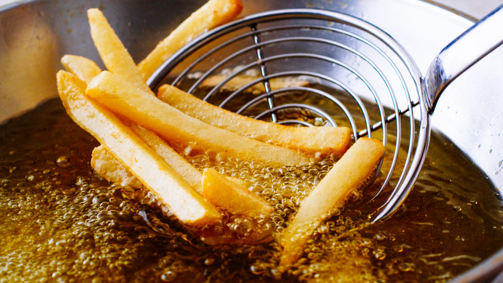 deep frying french fries with oil