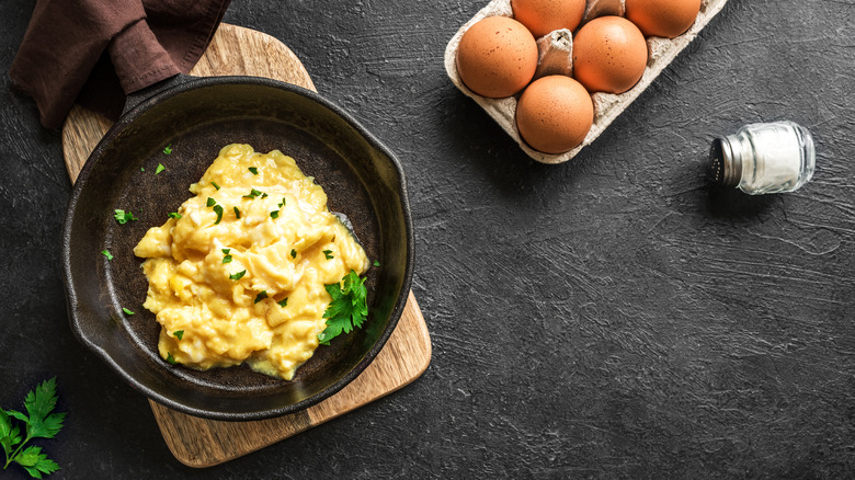 Freshly scrambled eggs still in a pan