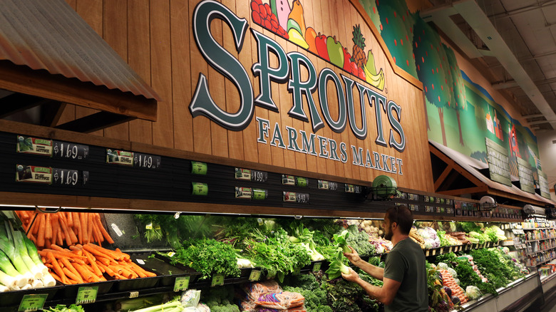 person browsing produce at Sprouts