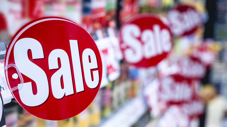 sale signs in grocery store