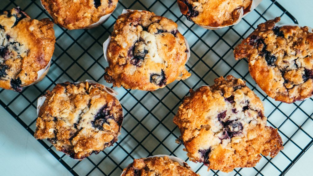 Blueberry muffins on rack