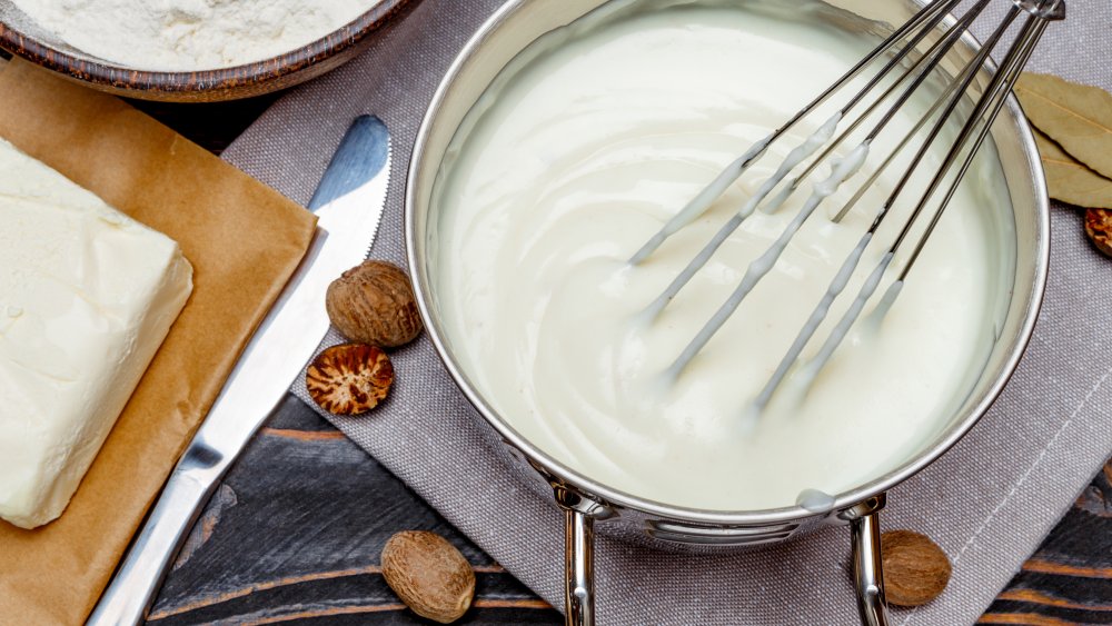 Whisking a béchamel for mac and cheese