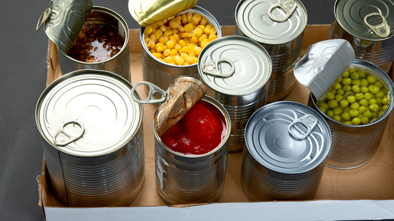 Unlabeled cans of vegetables