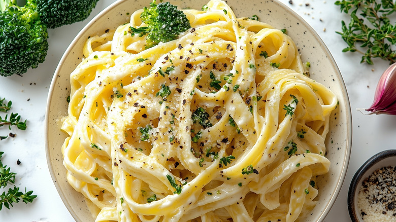 Dish of fettuccine Alfredo with garnishes