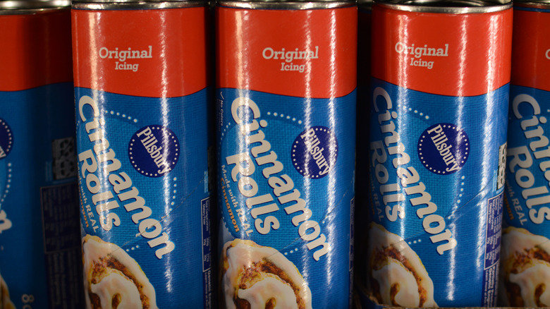 Tubes of Pillsbury Cinnamon Rolls dough