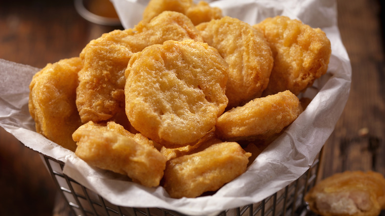 Basket of cooked chicken nuggets