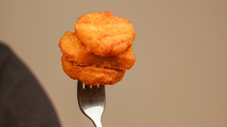 Nuggets stacked on a fork