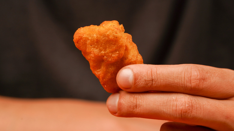 Person holding a nugget