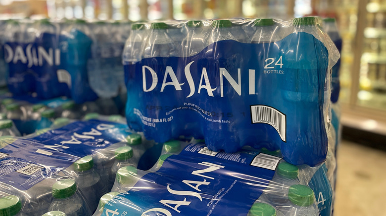 Closeup on grocery display of Dasani water in packaging