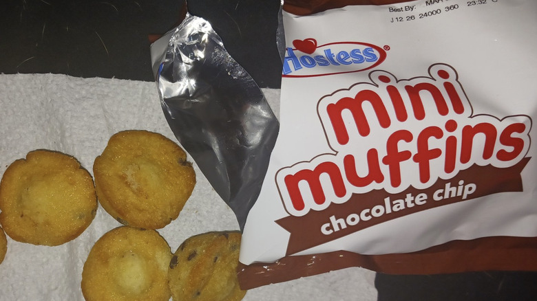 Package of Hostess chocolate chip mini muffins on paper towel