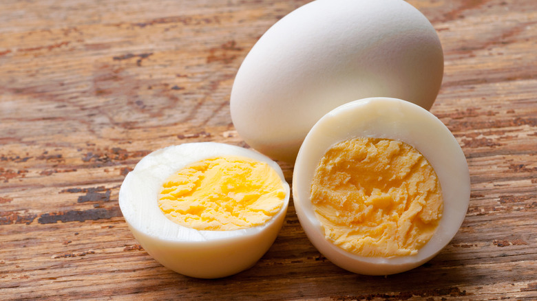 hard-boiled eggs wood background