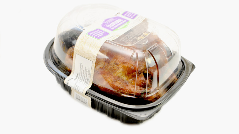 rotisserie chicken on white background