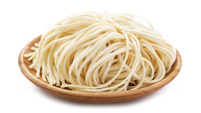 noodles on wooden plate