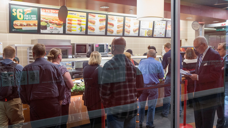 customers waiting at Subway