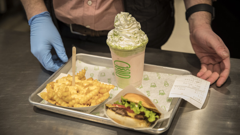 Shake Shack employee handles food