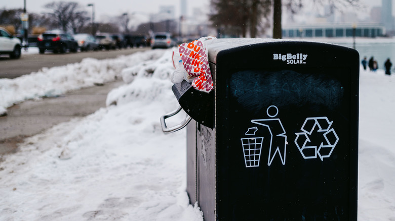 dunkin' bag in garbage