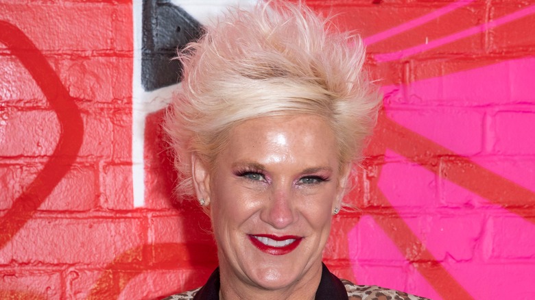 anne burrell posing for photo