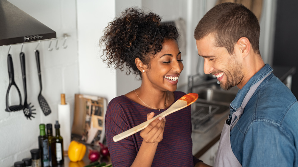 Couple cooking together