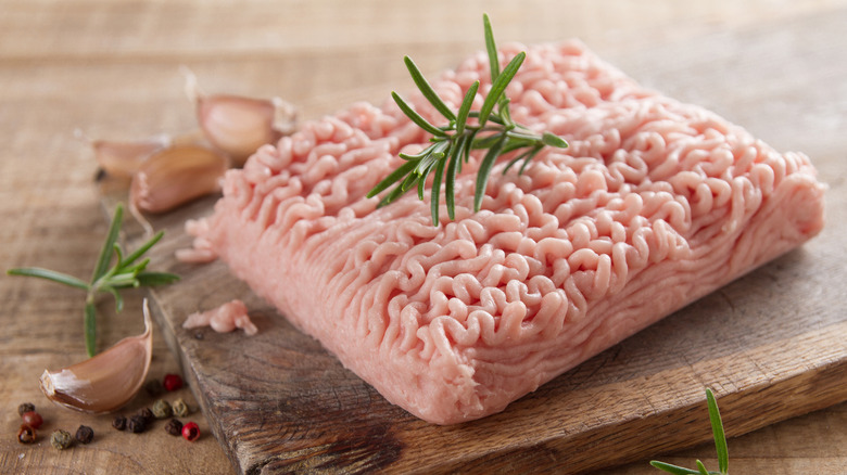 Ground turkey on a wooden board