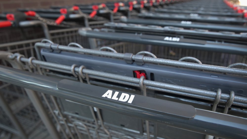 A line of Aldi shopping carts.