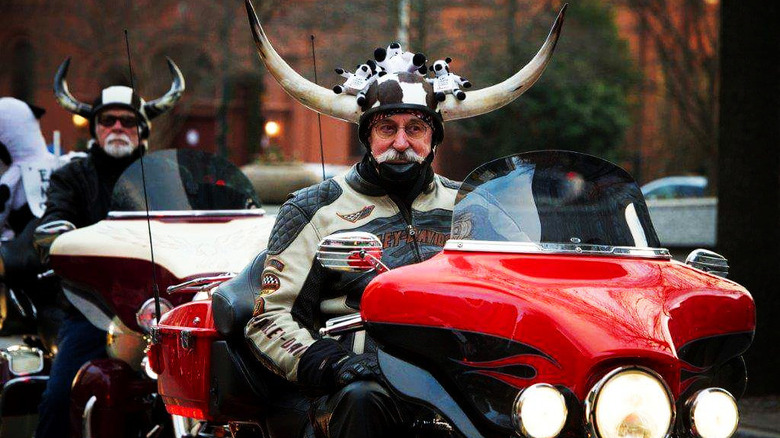 Moo Cow Bikers wearing horn helmets 